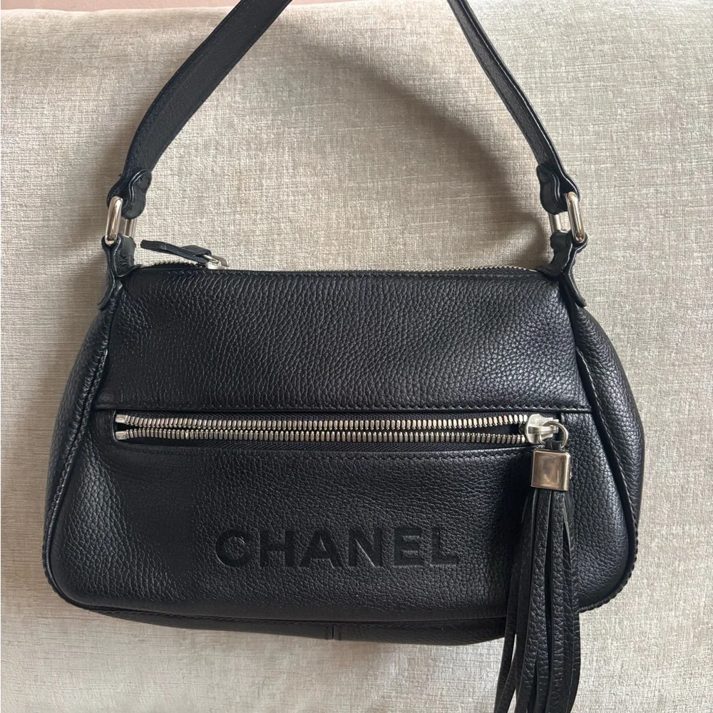 Authentic CHANEL black grained calfskin CC oversized charm baguette hobo bag